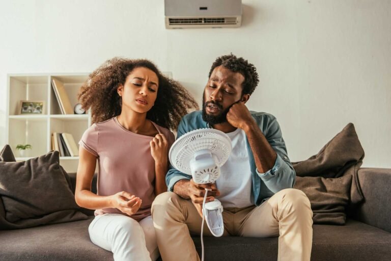 Why is my AC blowing warm air?